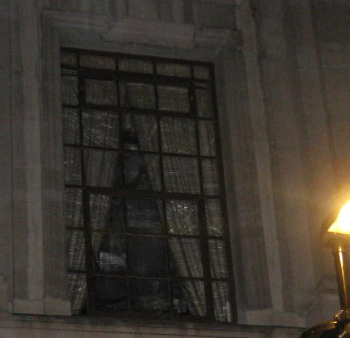 The window where a ghostly form is seen.